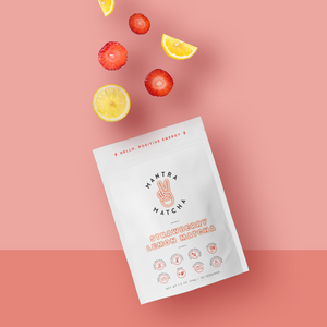 strawberries and lemon flying out of mantra matcha package