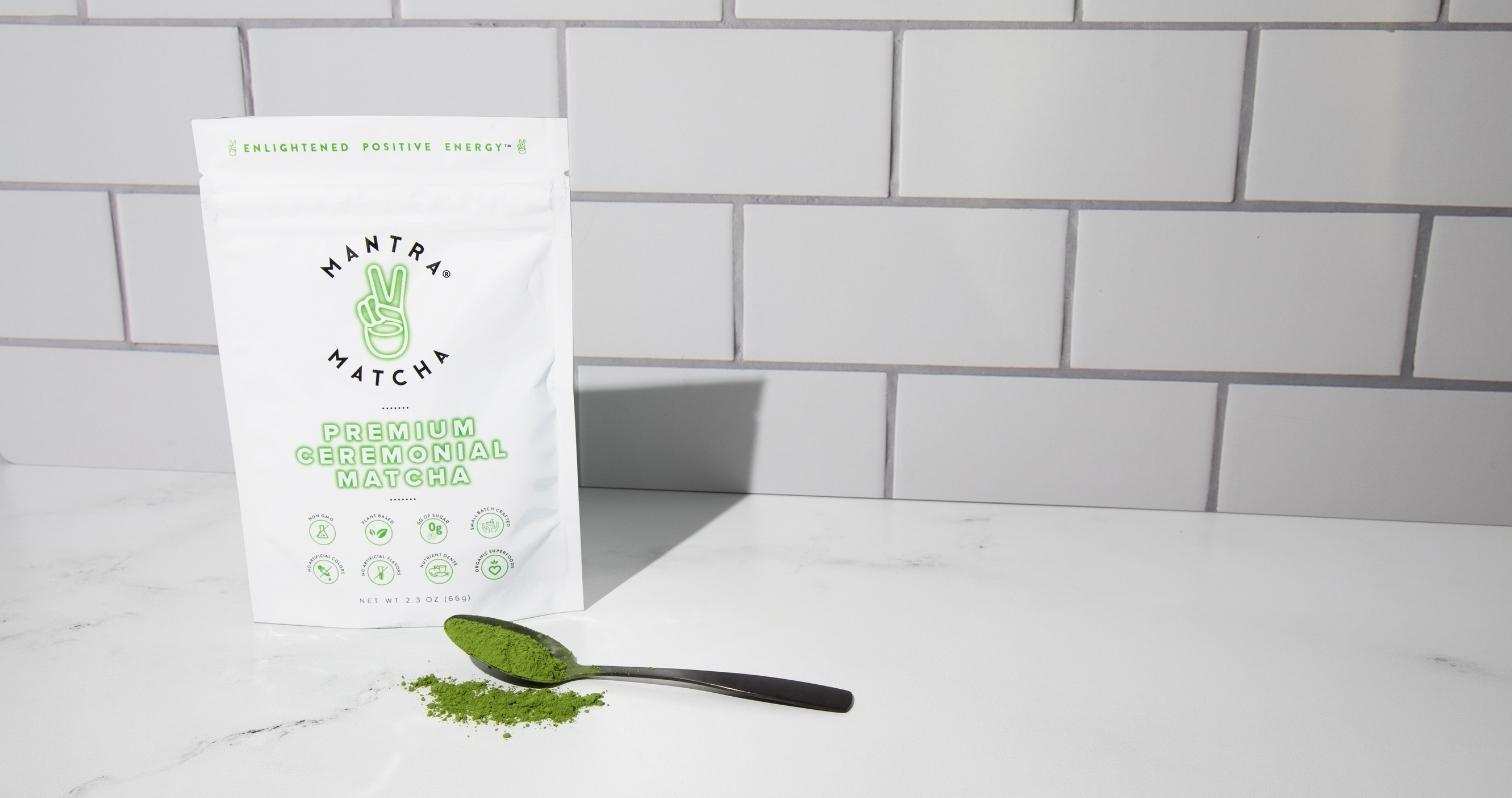 Image of Mantra matcha pouch, ceremonial matcha powder, and spoon